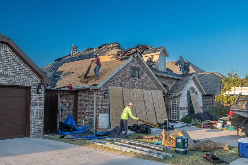 A house mid re-roof with the deck exposed