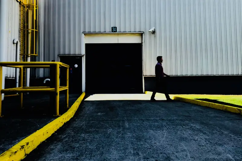 A commercial metal building with a loading bay door
